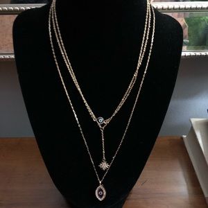 Three strand evil eye necklace